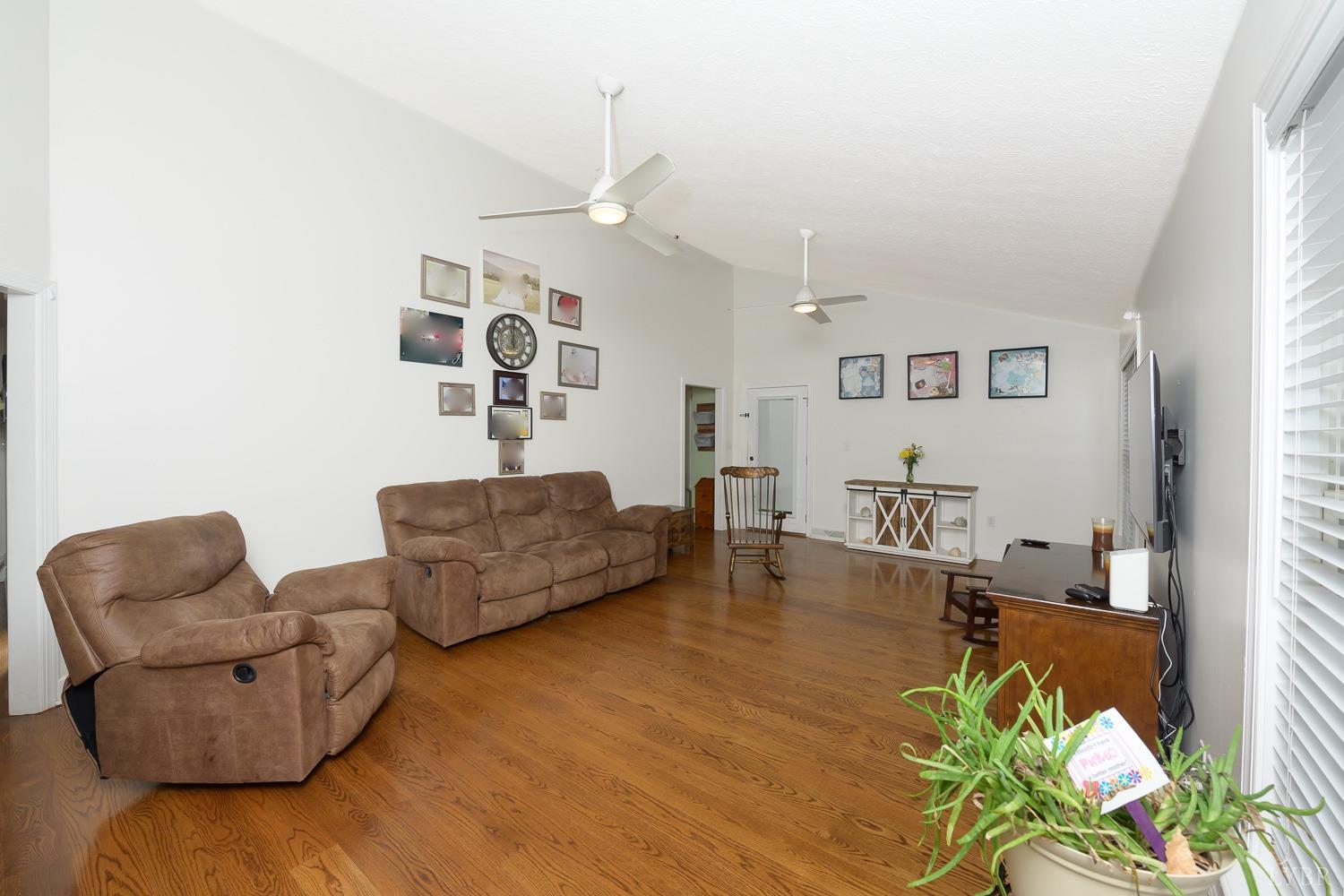 149 Locust Street Amherst, VA 24521 - Photo 40 of 86 a living room with furniture and wooden floor