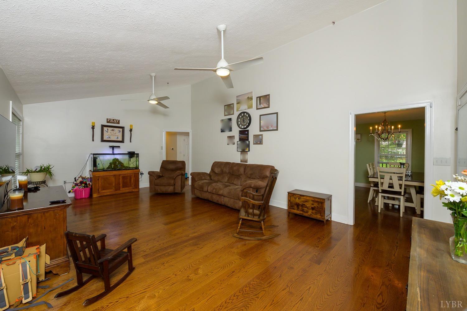 149 Locust Street Amherst, VA 24521 - Photo 41 of 86 a living room with furniture and wooden floor