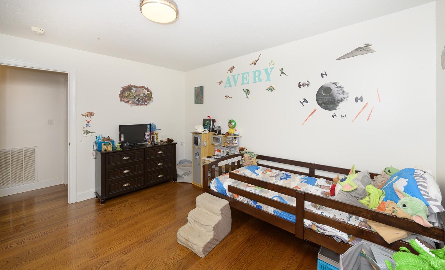 149 Locust Street Amherst, VA 24521 - Photo 48 of 86 a room with furniture and wooden floor