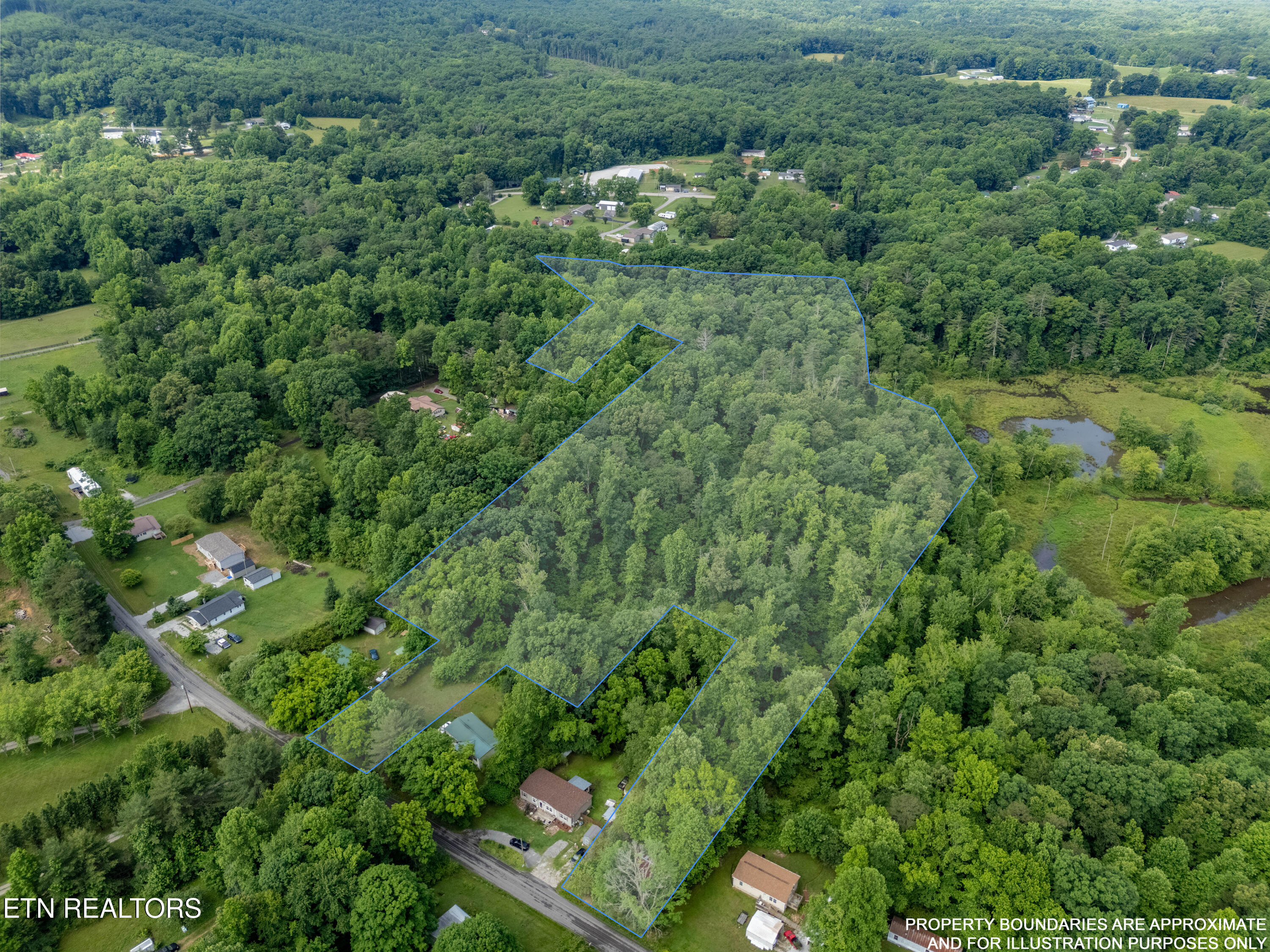 416 Liberty Road Wartburg, TN 37887 - Photo 1 of 14 DJI_20260528104141_0596_D-HDR-LOT-LINES