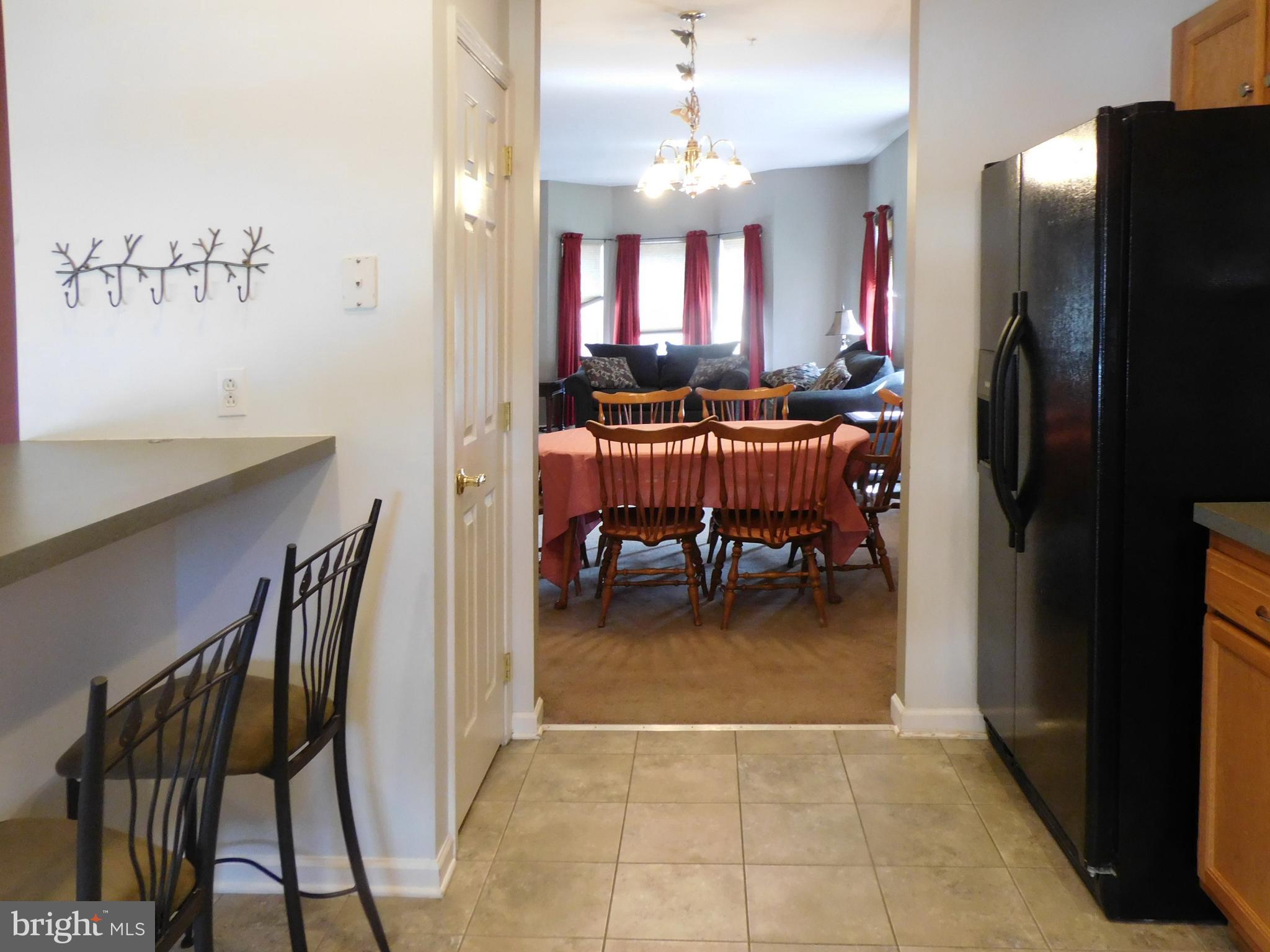 10 Turtle Court, Unit 10 Delanco, NJ 08075 - Photo 13 of 45 View into the living room from kitchen