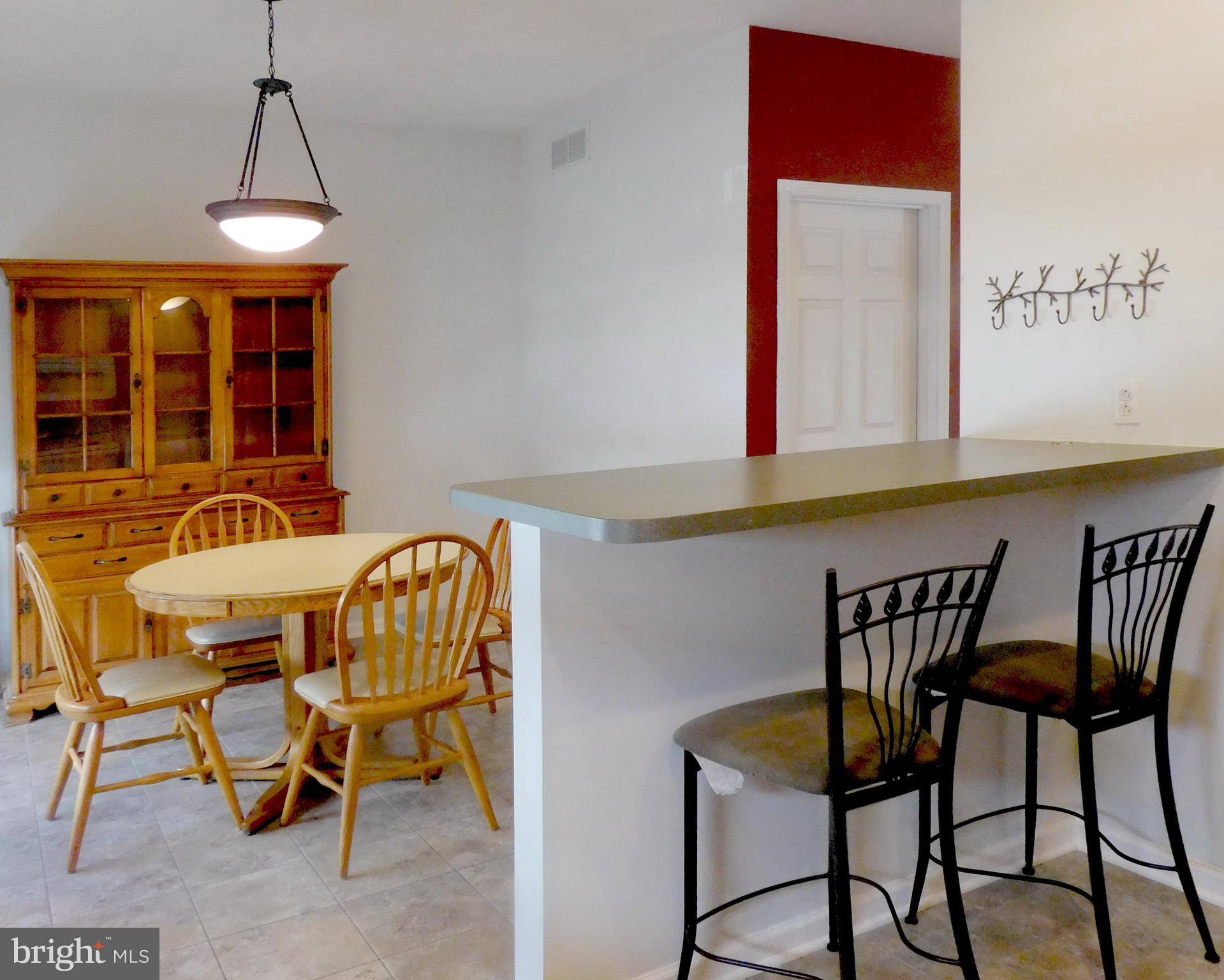 10 Turtle Court, Unit 10 Delanco, NJ 08075 - Photo 20 of 45 View from bar into kitchen dining area.