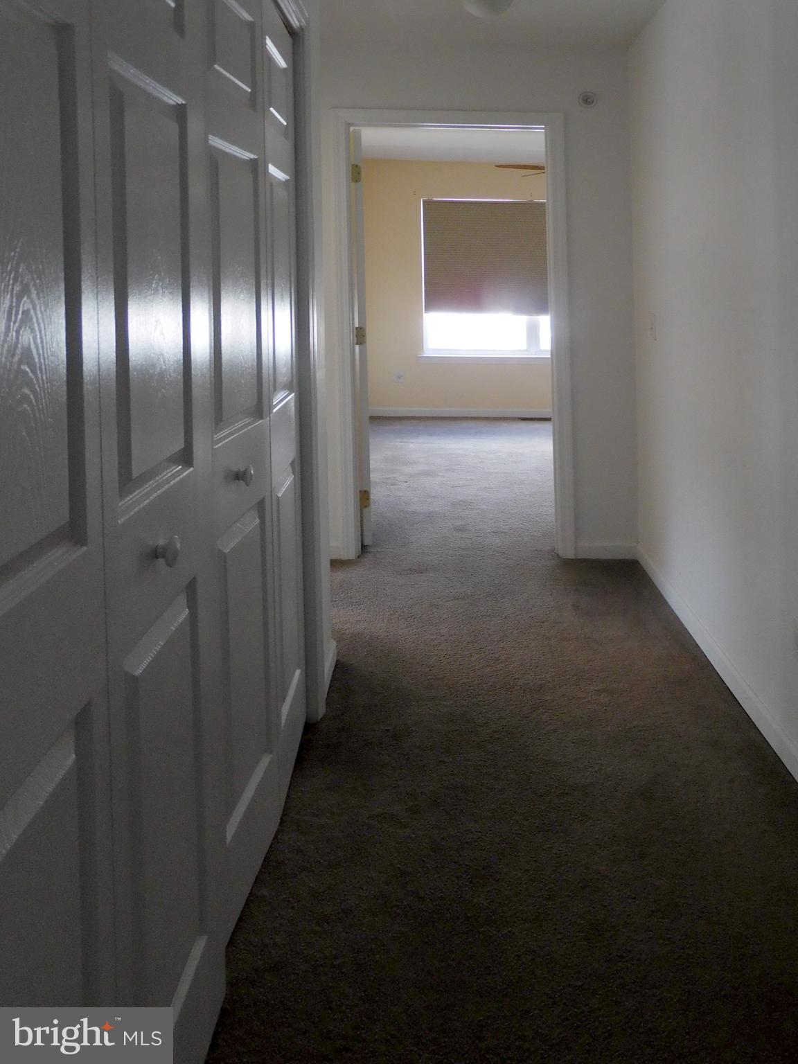 10 Turtle Court, Unit 10 Delanco, NJ 08075 - Photo 36 of 45 Hallway, Doors that enclose washer and dryer