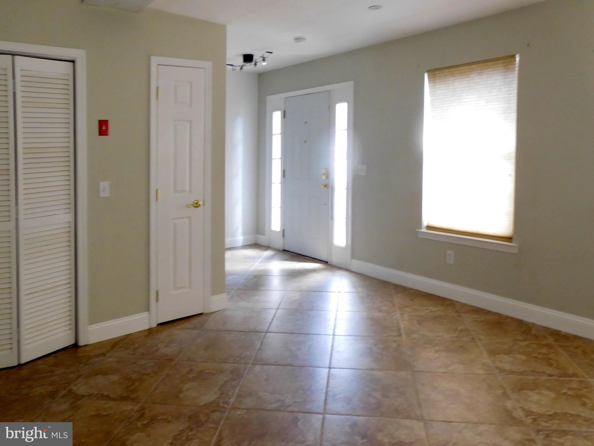 10 Turtle Court, Unit 10 Delanco, NJ 08075 - Photo 9 of 45 Entrance from the garage into the front interior.