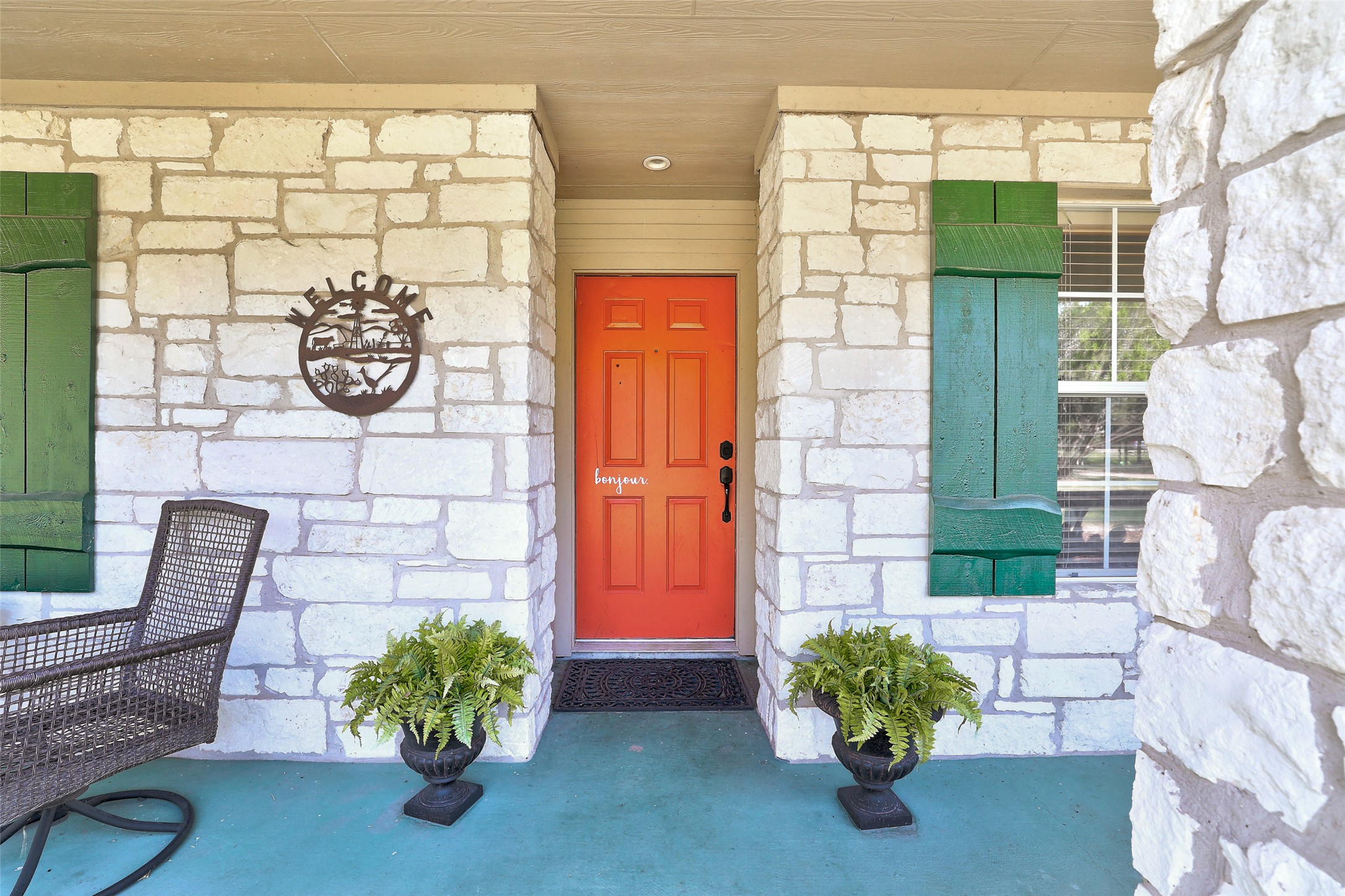 125 Kyle Lane Georgetown, TX 78633 - Photo 10 of 34 Property entrance featuring stone siding and a porch