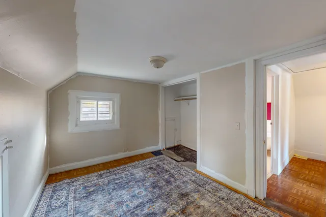 a bathroom with a bathtub sink and mirror
