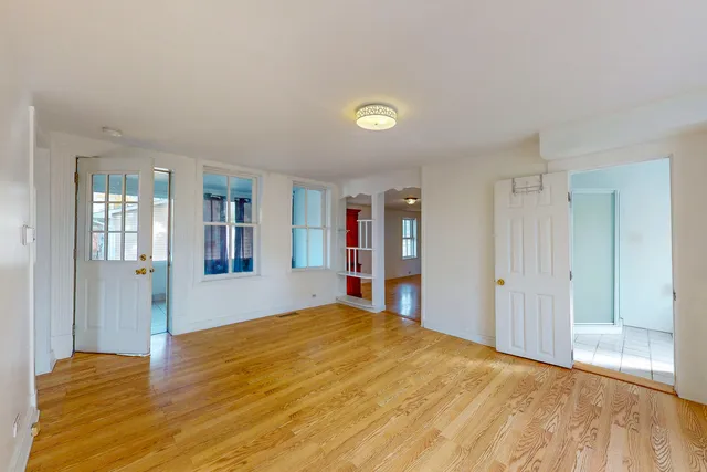 a view of a closet area with living room