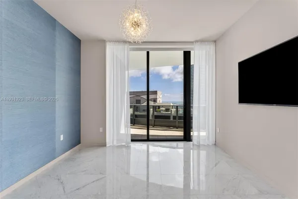 a view of a livingroom with a flat screen tv