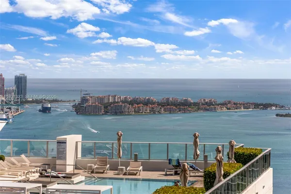 a view of a lake with a terrace