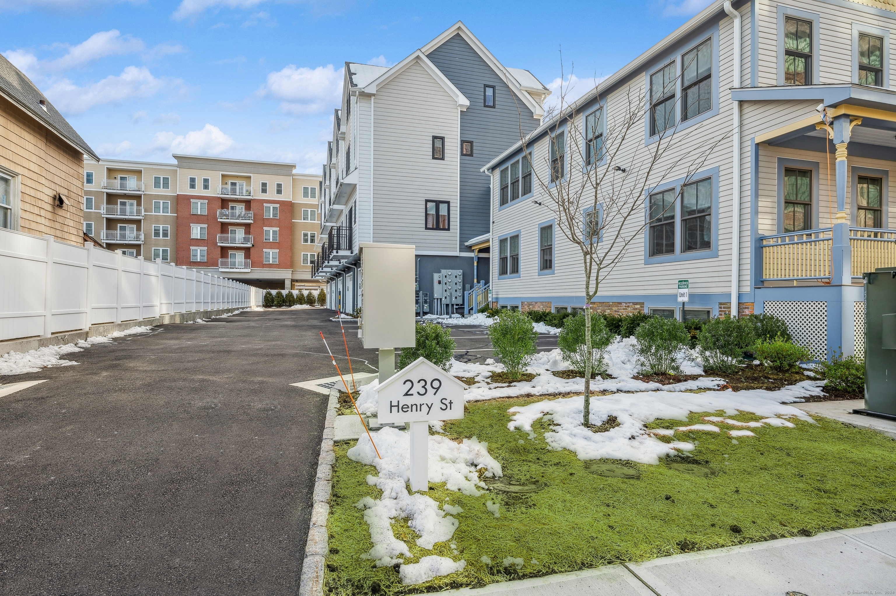 239 Henry Street, Unit 3 Stamford, CT 06902 - Photo 1 of 1 a view of a house with backyard