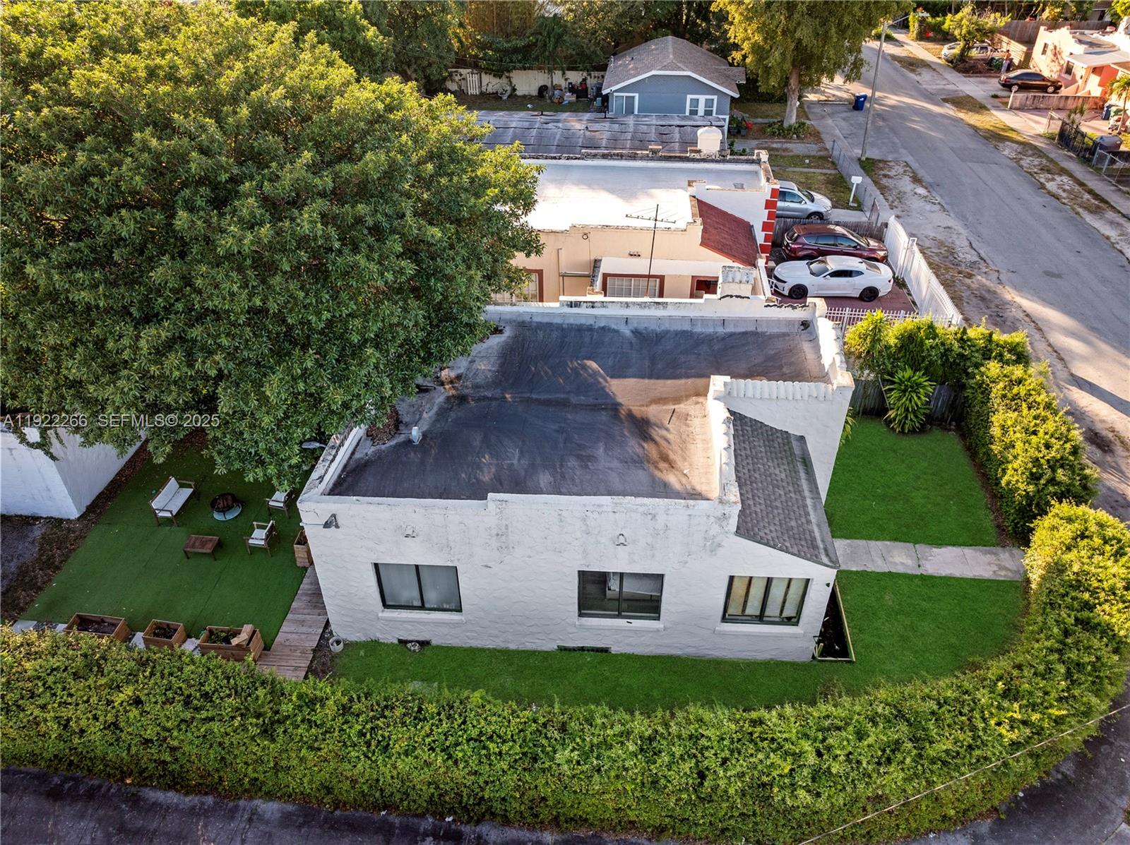 1910 Northwest 47th Street Miami, FL 33142 - Photo 2 of 32 an aerial view of a house