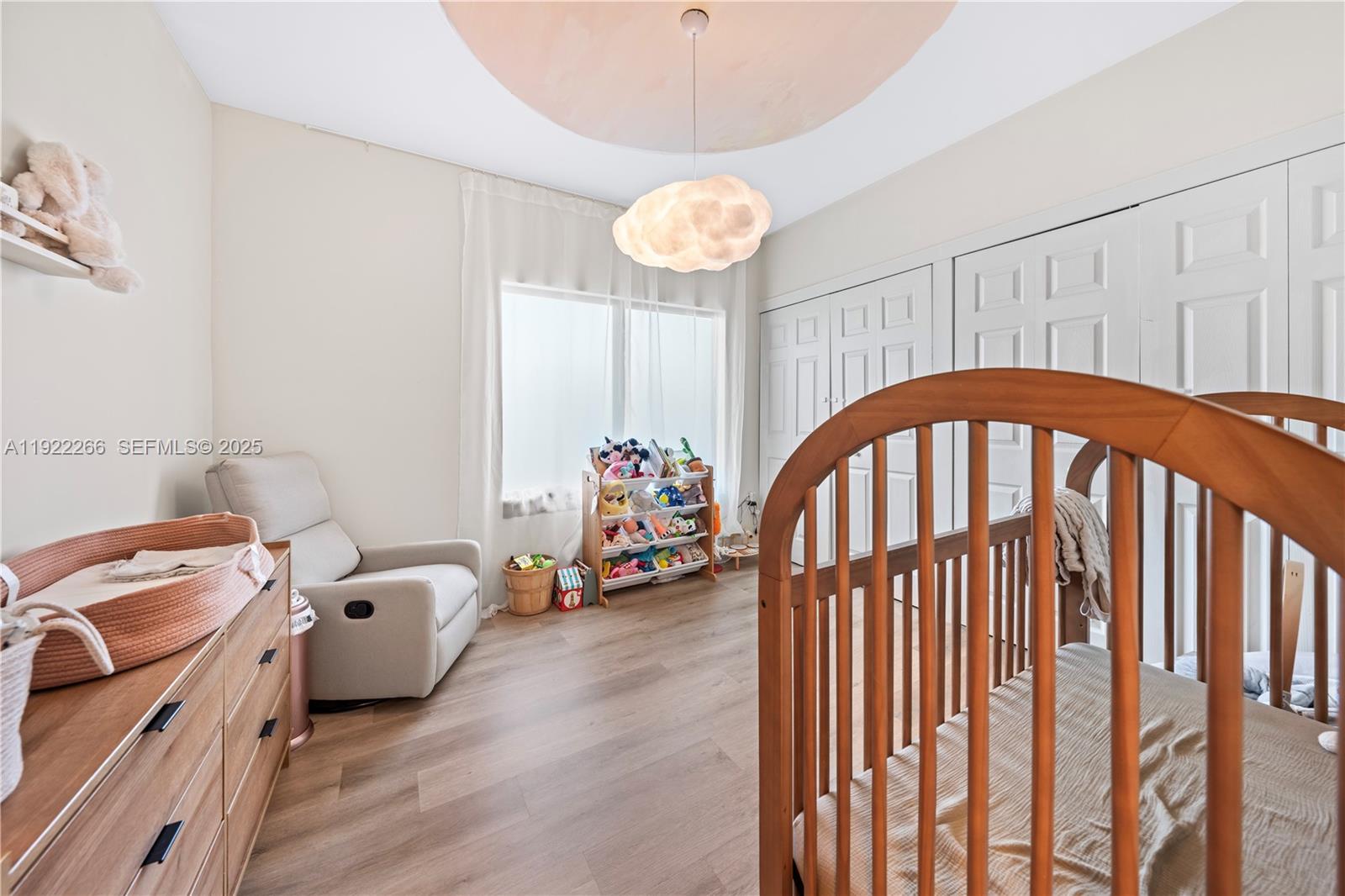 1910 Northwest 47th Street Miami, FL 33142 - Photo 21 of 32 a view of a livingroom with furniture and toys