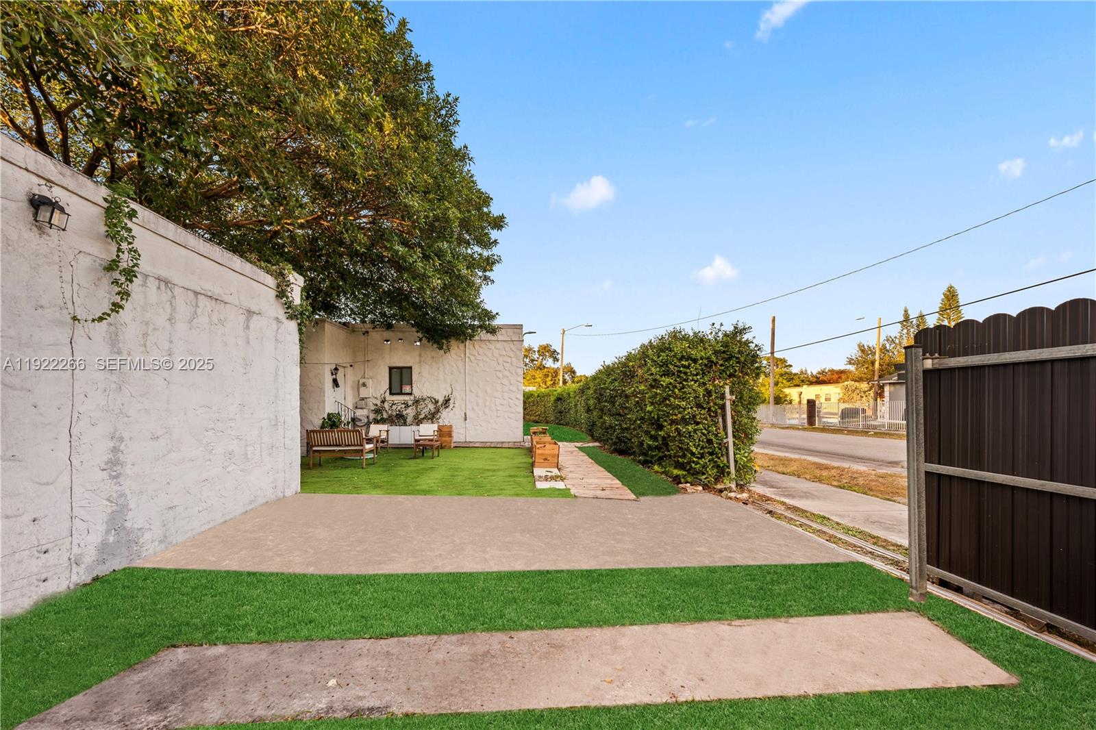 1910 Northwest 47th Street Miami, FL 33142 - Photo 31 of 32 a view of a backyard