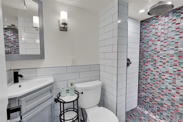 a bathroom with a toilet and a sink