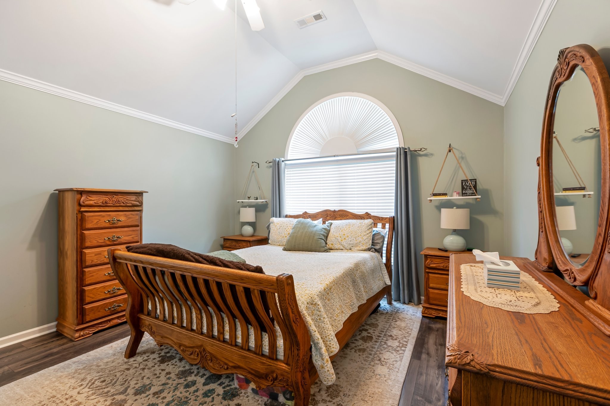 4025 Deer Run Trace Spring Hill, TN 37174 - Photo 13 of 54 a bedroom with a bed a mirror on dresser and a window