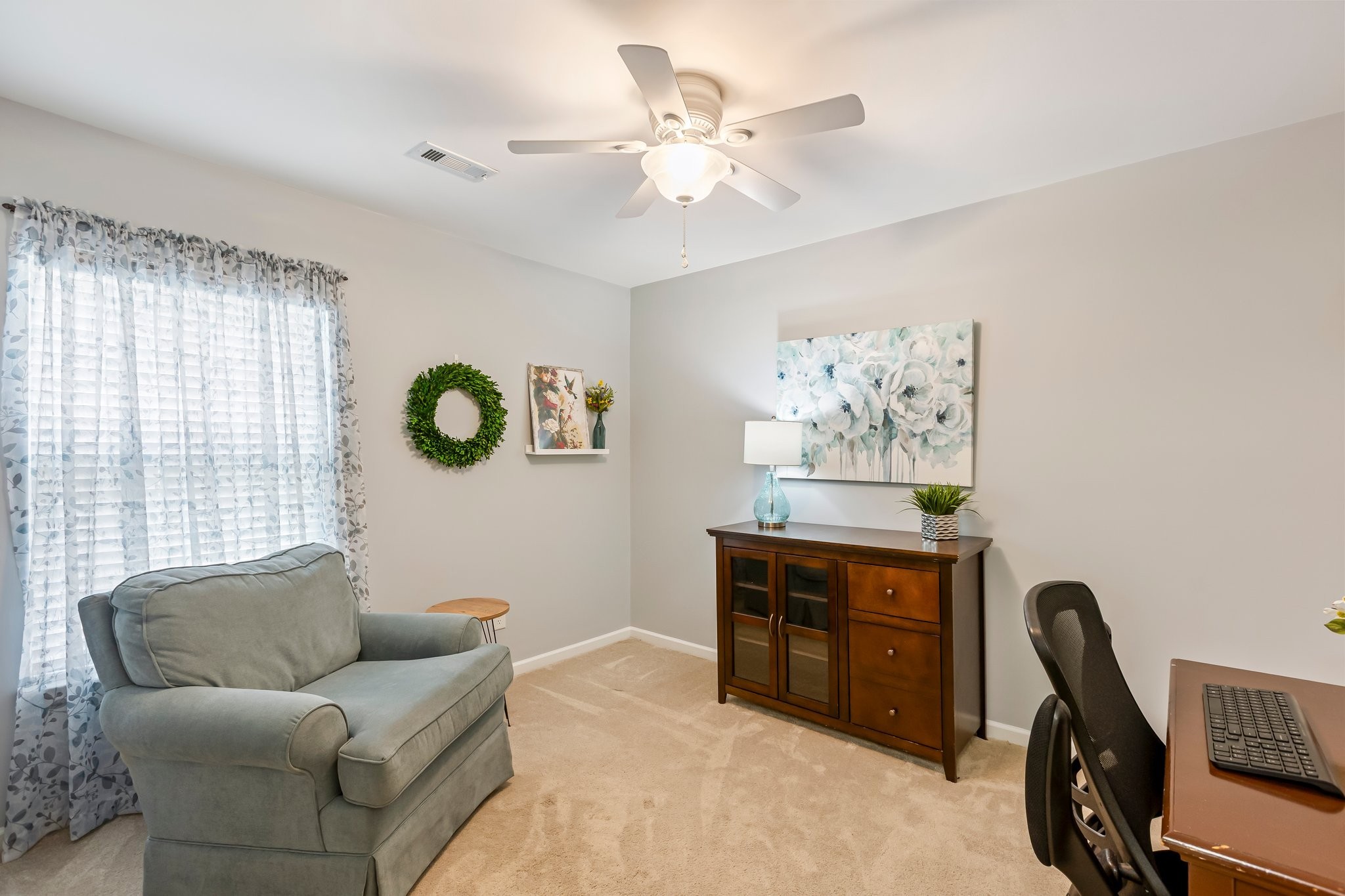 4025 Deer Run Trace Spring Hill, TN 37174 - Photo 21 of 54 a living room with furniture and a window