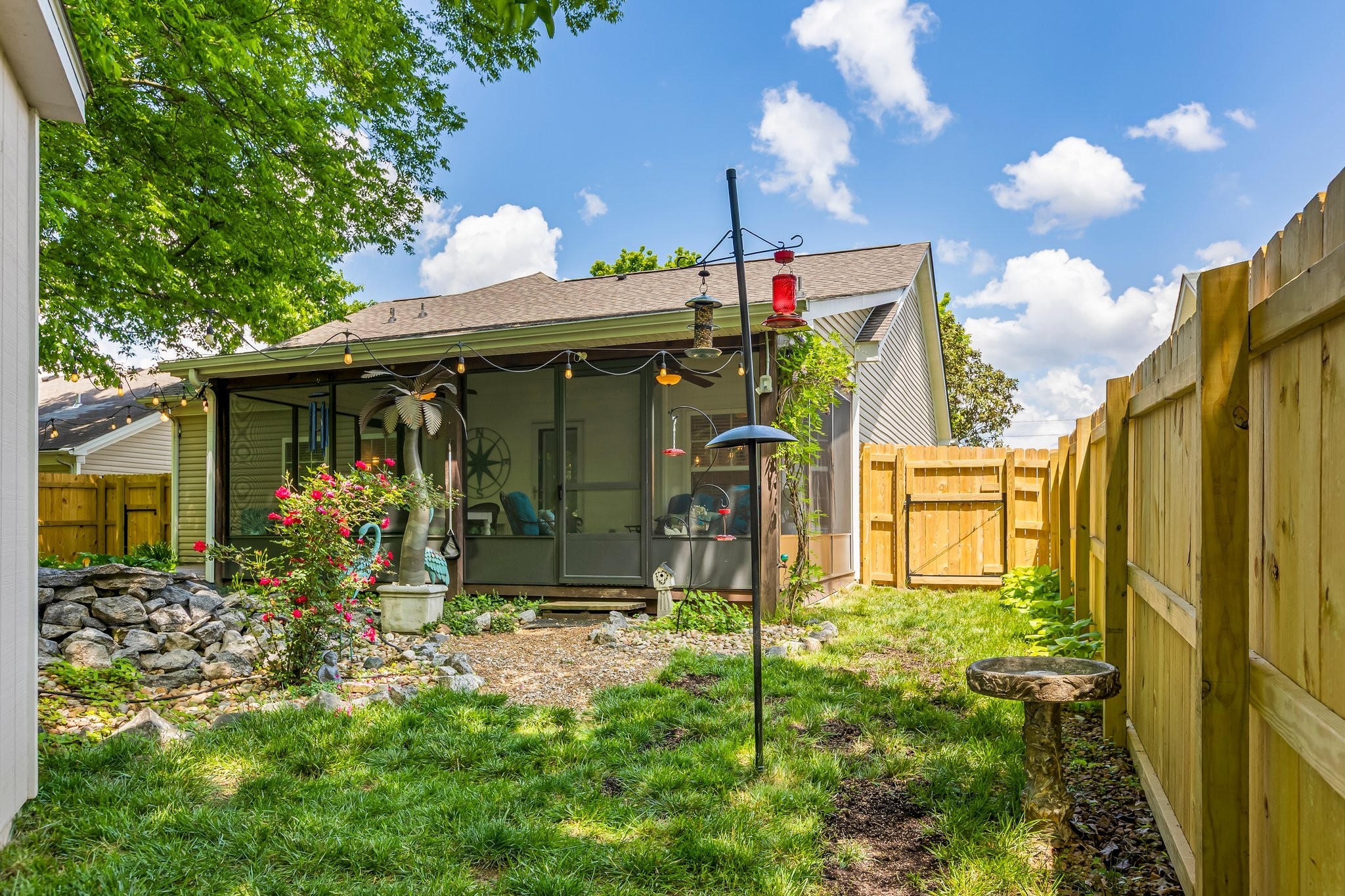 4025 Deer Run Trace Spring Hill, TN 37174 - Photo 34 of 54 a front view of a house with garden