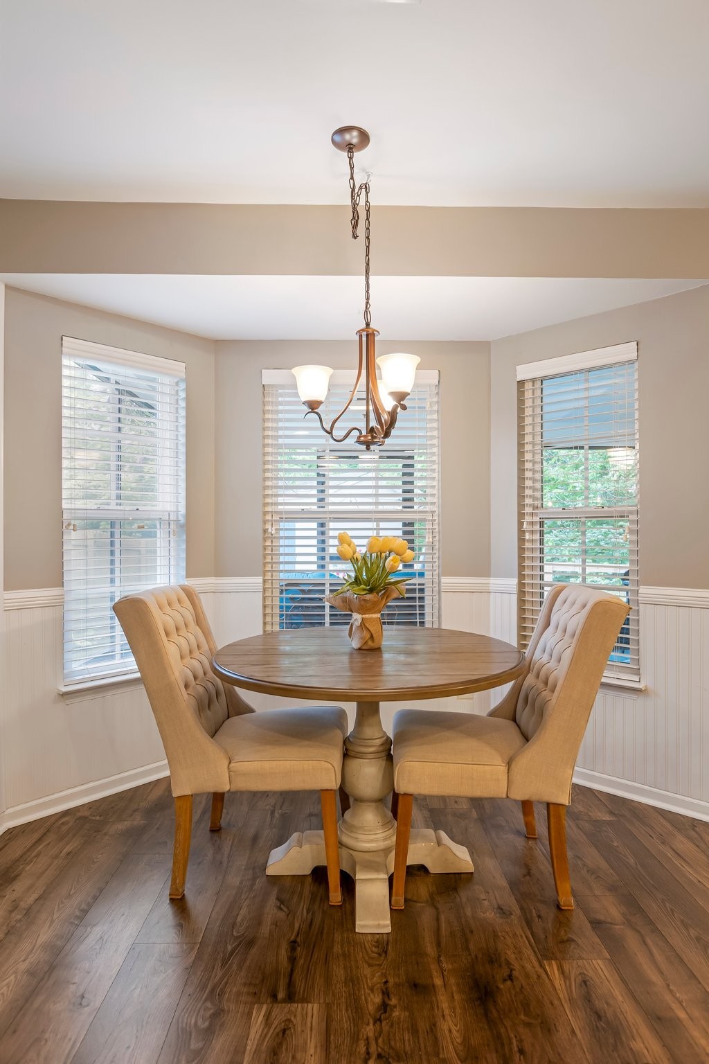 4025 Deer Run Trace Spring Hill, TN 37174 - Photo 10 of 54 a dining room with furniture a chandelier and wooden floor
