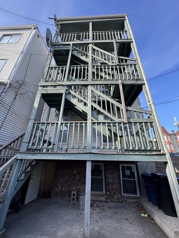 289 Chelsea Street Boston, MA 02128 - Photo 23 of 23 a view of a big building with many windows
