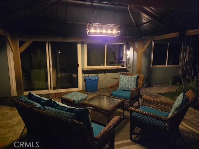 a outdoor living space with furniture and window