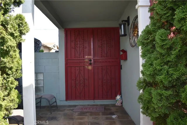 a view of a door and wooden wall