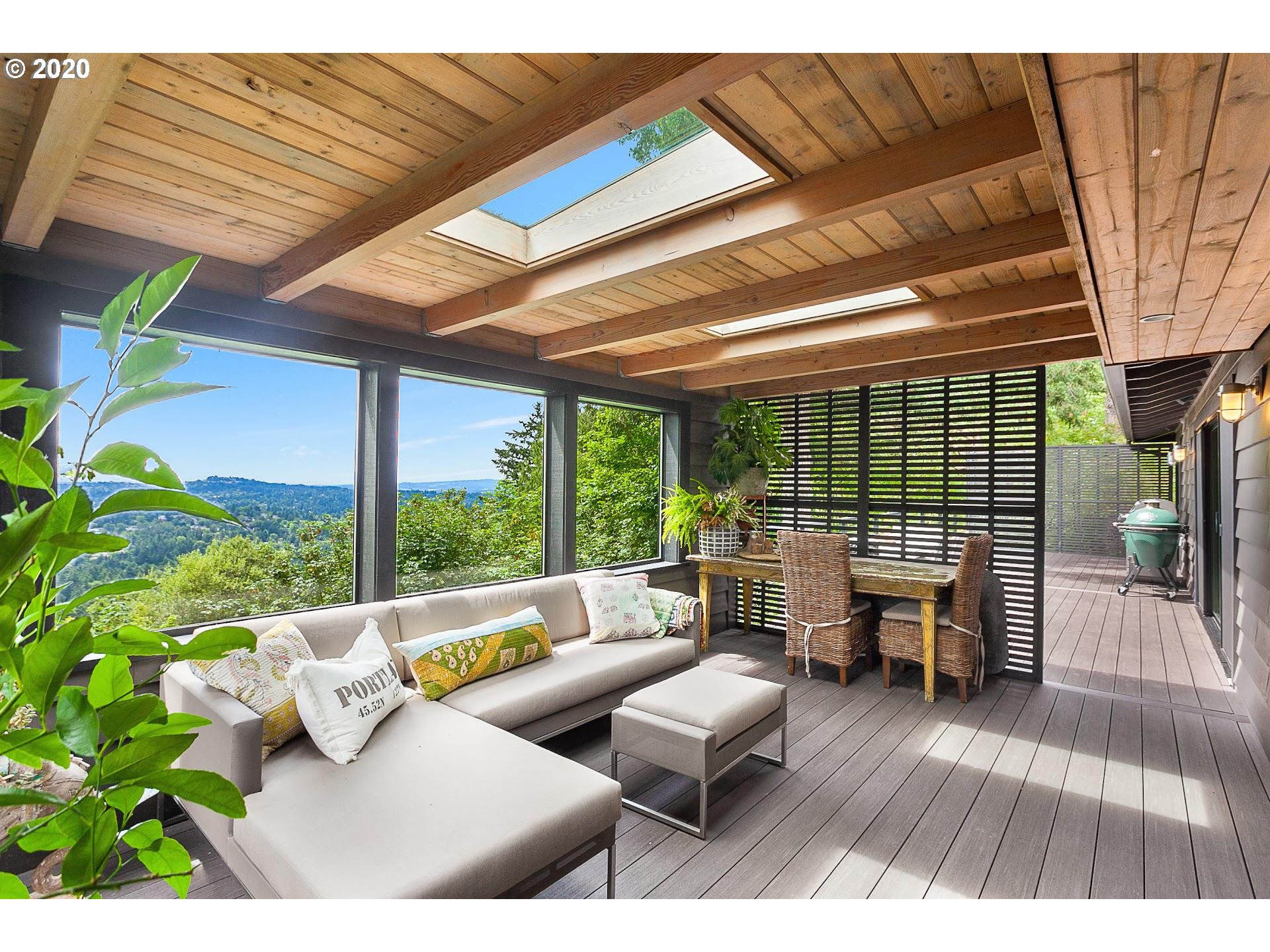 4155 Southwest Agate Lane Portland, OR 97239 - Photo 14 of 32 a outdoor living space with furniture and a potted plant