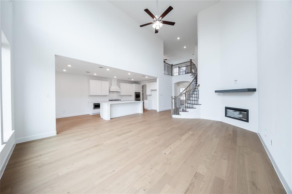 3807 Majesty Court Forney, TX 75126 - Photo 10 of 37 a view of a kitchen with a sink and cabinets
