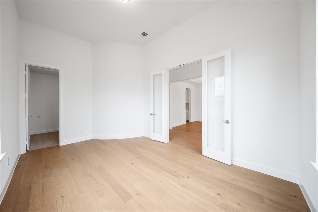 3807 Majesty Court Forney, TX 75126 - Photo 16 of 37 a bedroom with a bed and a window