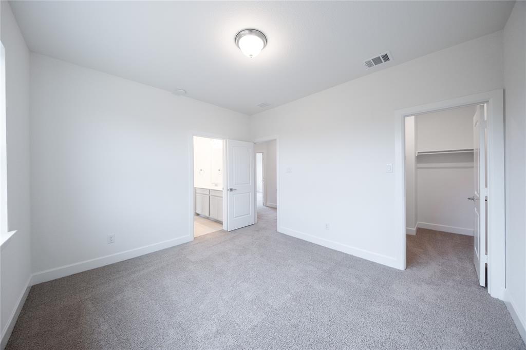 3807 Majesty Court Forney, TX 75126 - Photo 21 of 37 a view of an empty room and a window