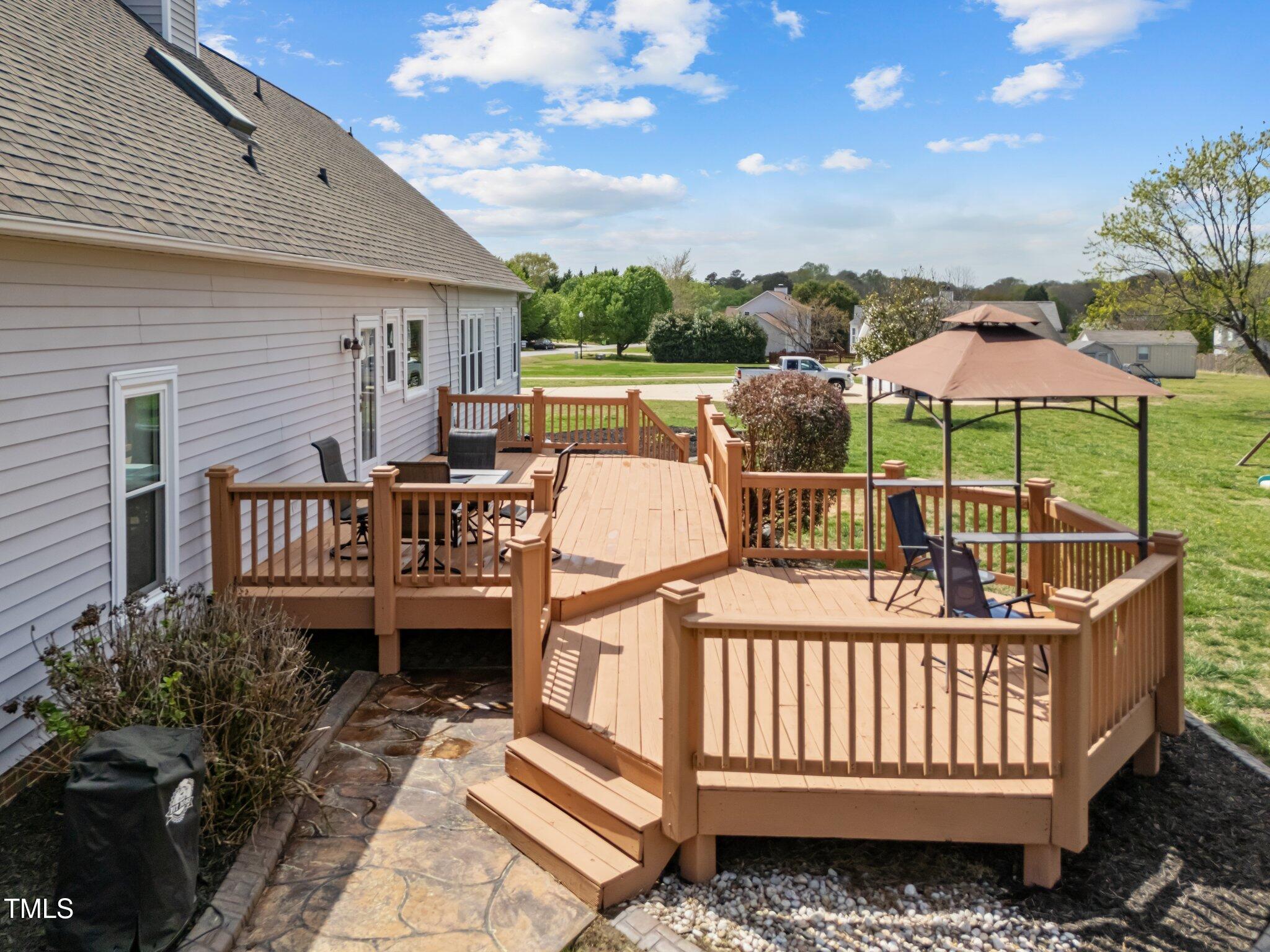 1408 Harvey Johnson Road Raleigh, NC 27603 - Photo 3 of 48 a view of a roof deck with furniture