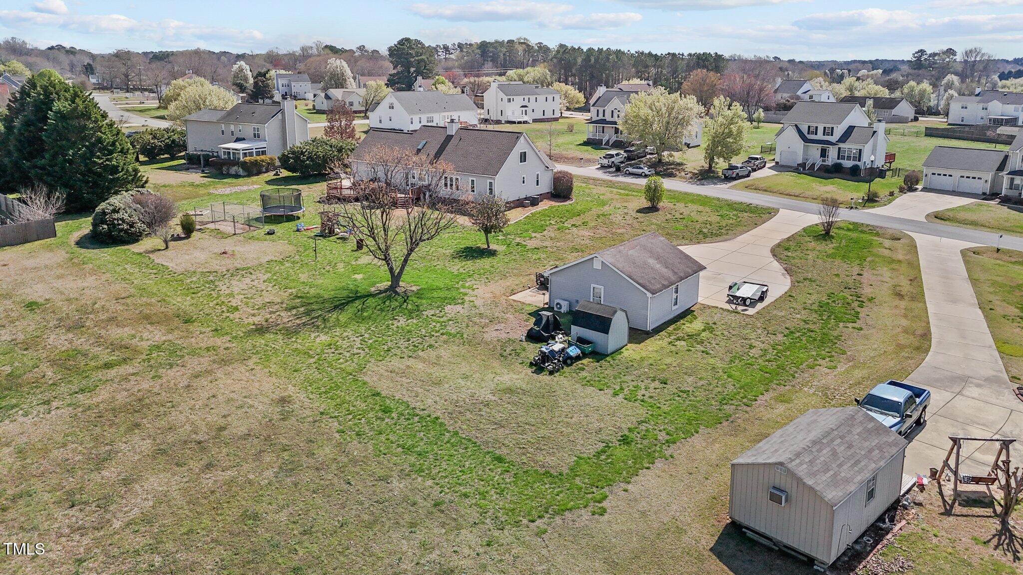 1408 Harvey Johnson Road Raleigh, NC 27603 - Photo 46 of 48 an aerial view of a house with outdoor space