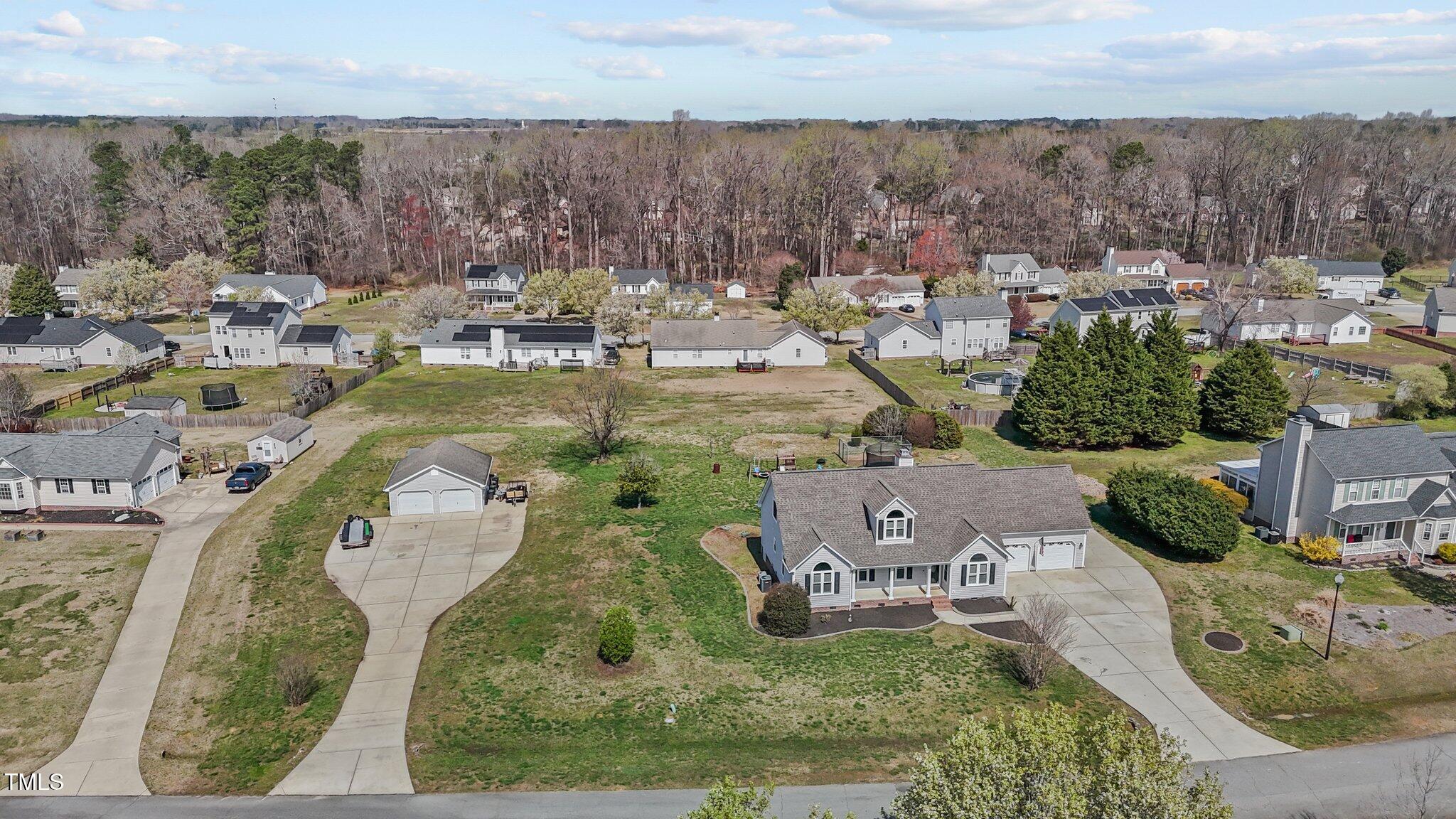 1408 Harvey Johnson Road Raleigh, NC 27603 - Photo 5 of 48 an aerial view of a house with outdoor space