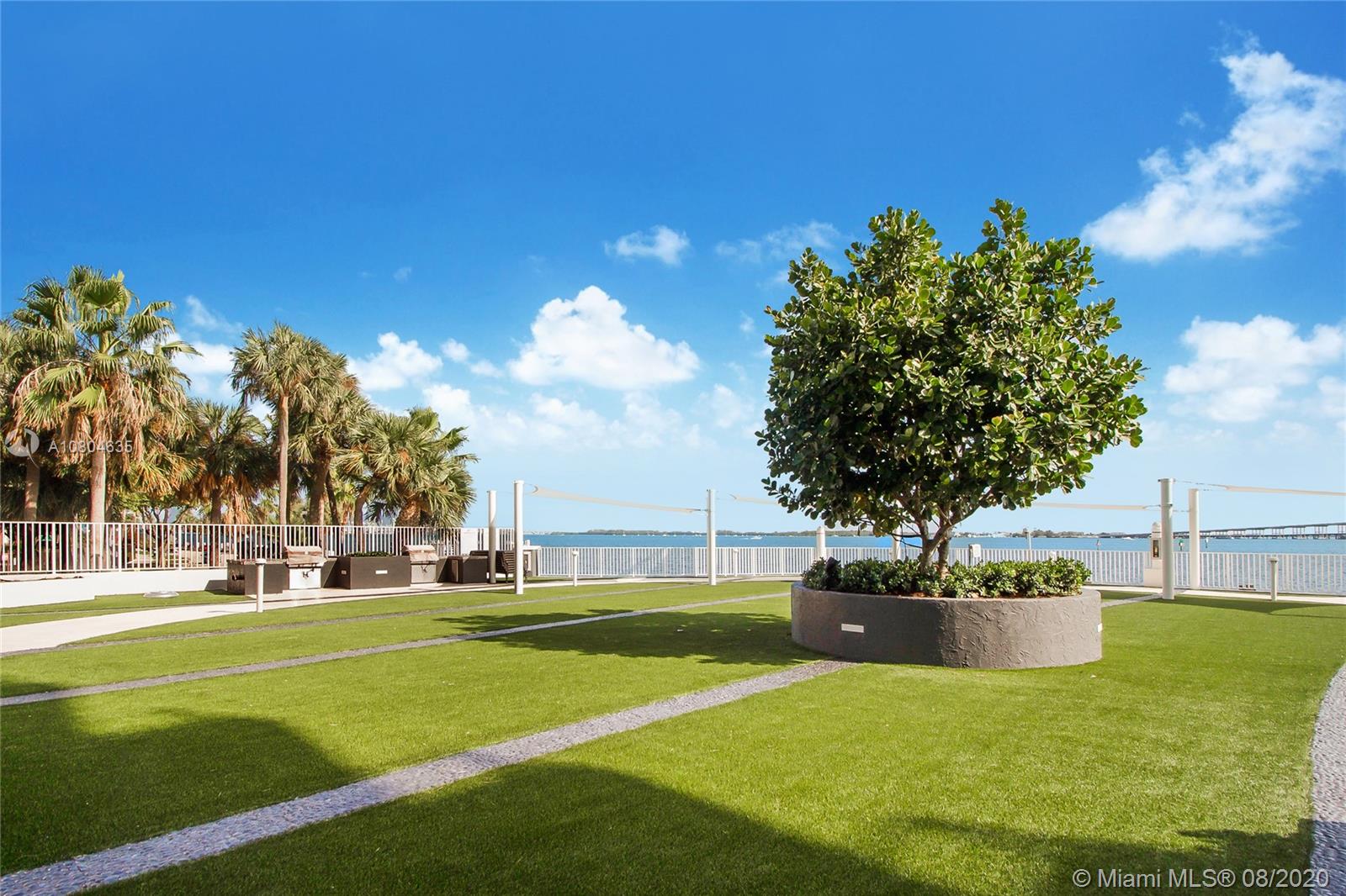 200 Southeast 15th Road, Unit 6D Miami, FL 33129 - Photo 18 of 20 a view of a house with a big yard