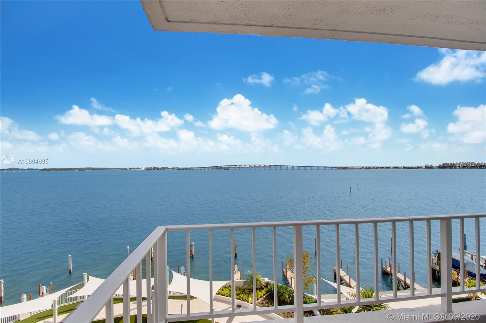 200 Southeast 15th Road, Unit 6D Miami, FL 33129 - Photo 2 of 20 a view of sitting area with furniture and wooden fence