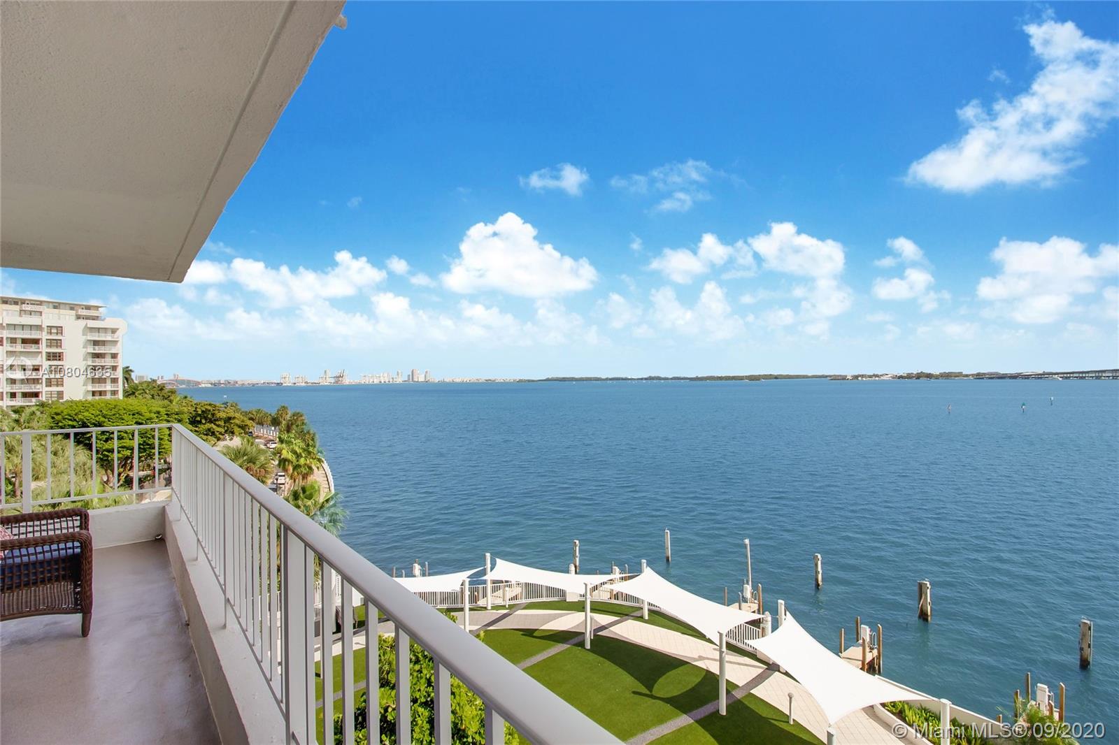 200 Southeast 15th Road, Unit 6D Miami, FL 33129 - Photo 3 of 20 a view of a balcony with two chairs