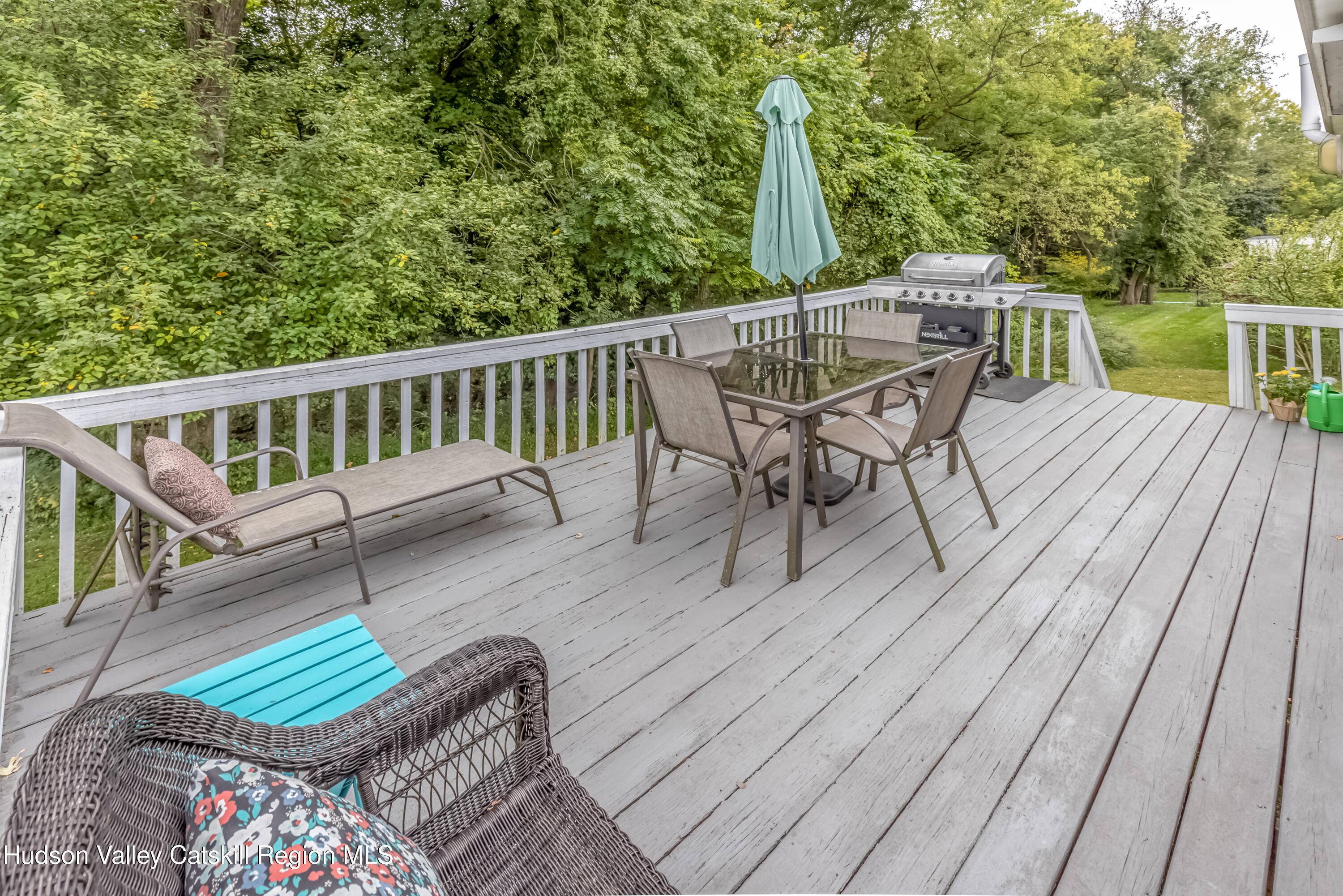 67 Cardinal Drive Poughkeepsie, NY 12601 - Photo 13 of 31 a view of a chairs and table on the wooden floor