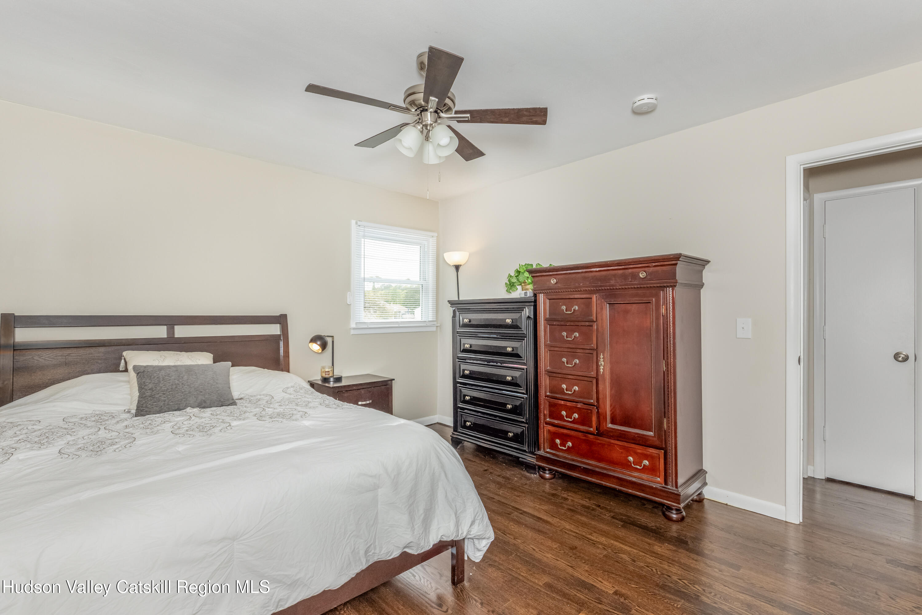 67 Cardinal Drive Poughkeepsie, NY 12601 - Photo 15 of 31 a bedroom with a bed and a dresser