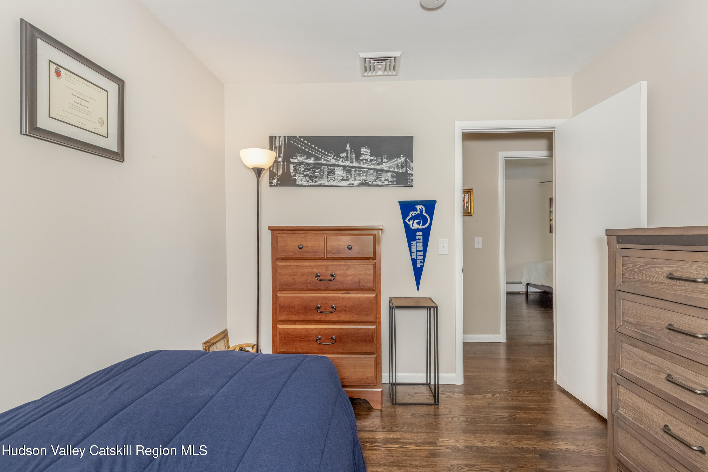 67 Cardinal Drive Poughkeepsie, NY 12601 - Photo 22 of 31 a view of bedroom with wooden floor