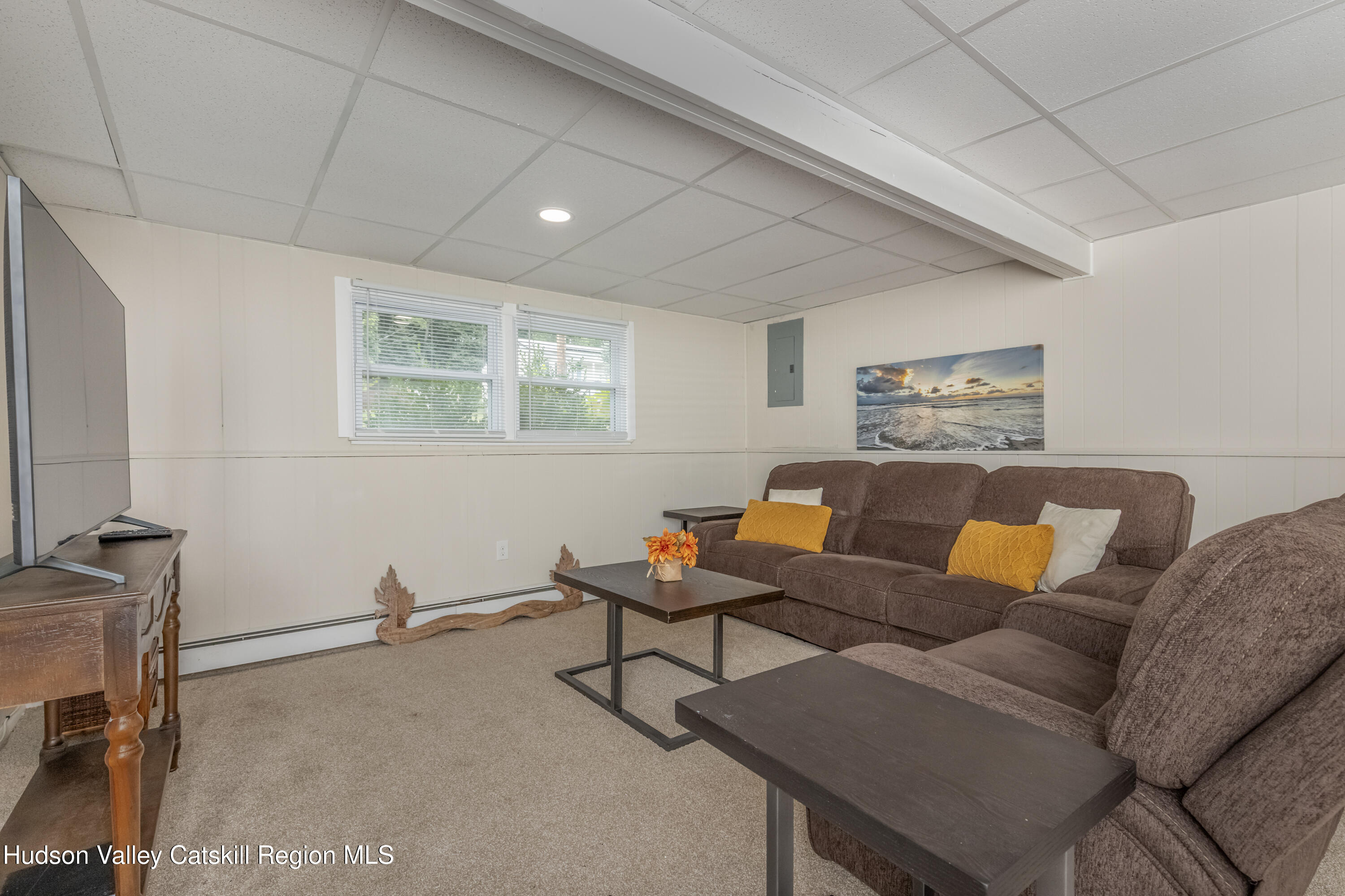67 Cardinal Drive Poughkeepsie, NY 12601 - Photo 24 of 31 a living room with furniture and a window