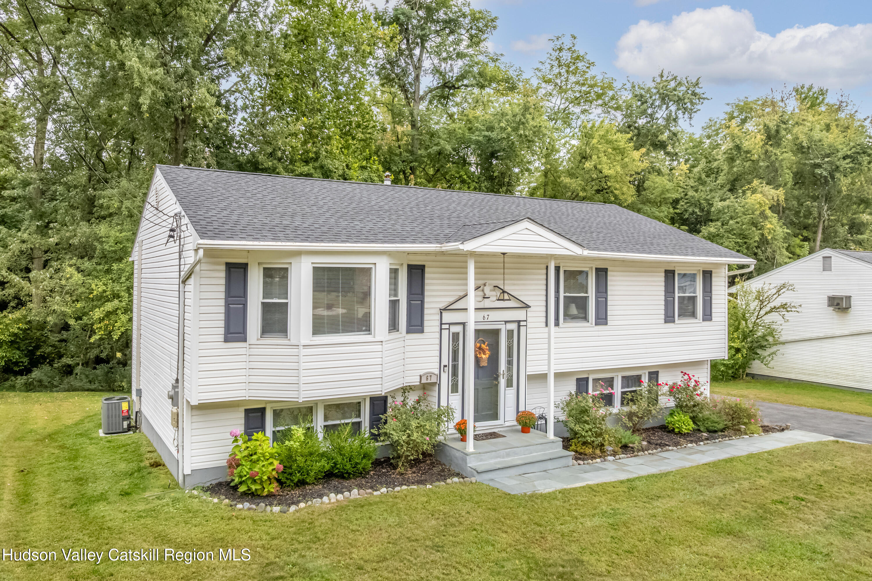 67 Cardinal Drive Poughkeepsie, NY 12601 - Photo 28 of 31 a front view of a house with a yard