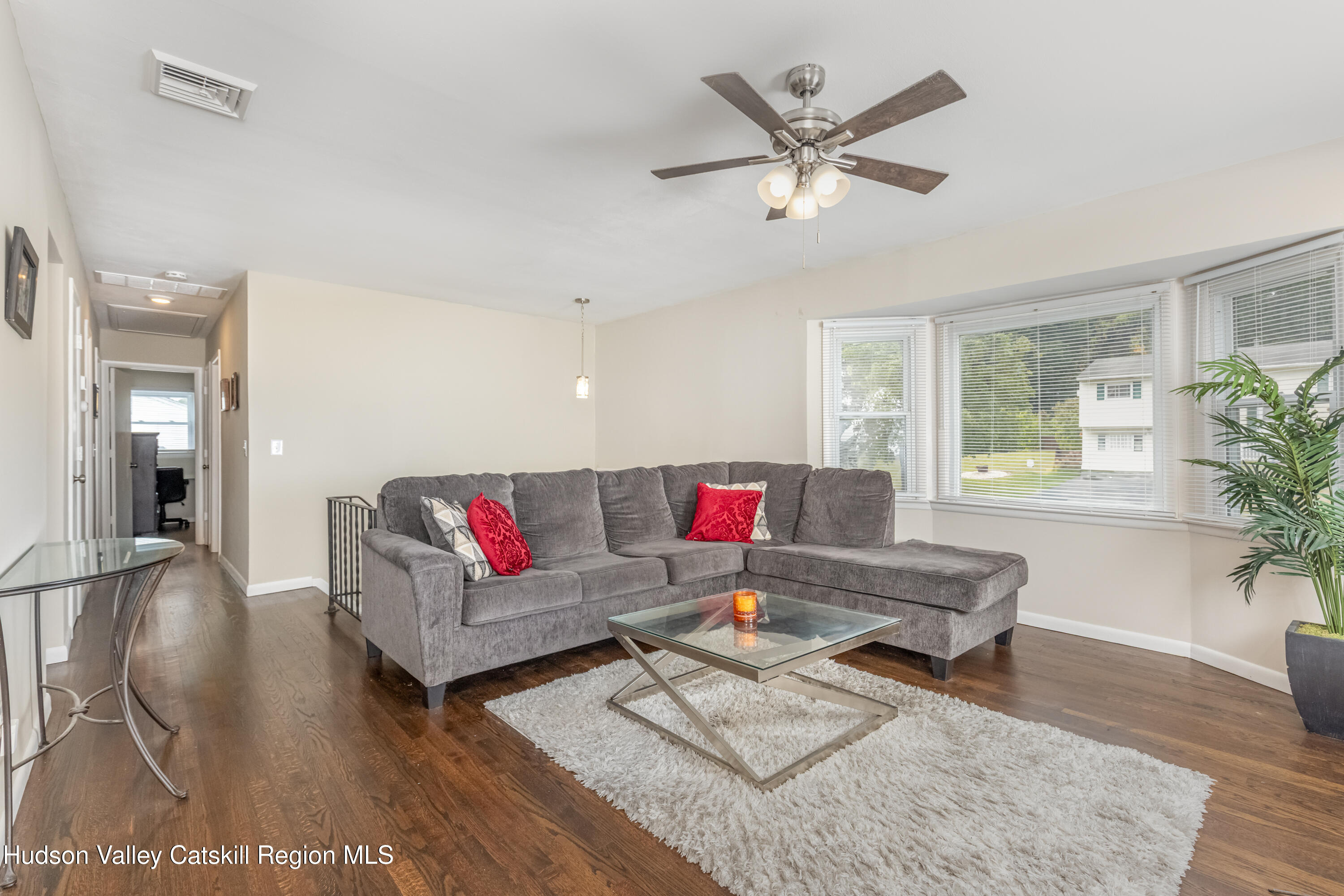 67 Cardinal Drive Poughkeepsie, NY 12601 - Photo 6 of 31 a living room with furniture and wooden floor