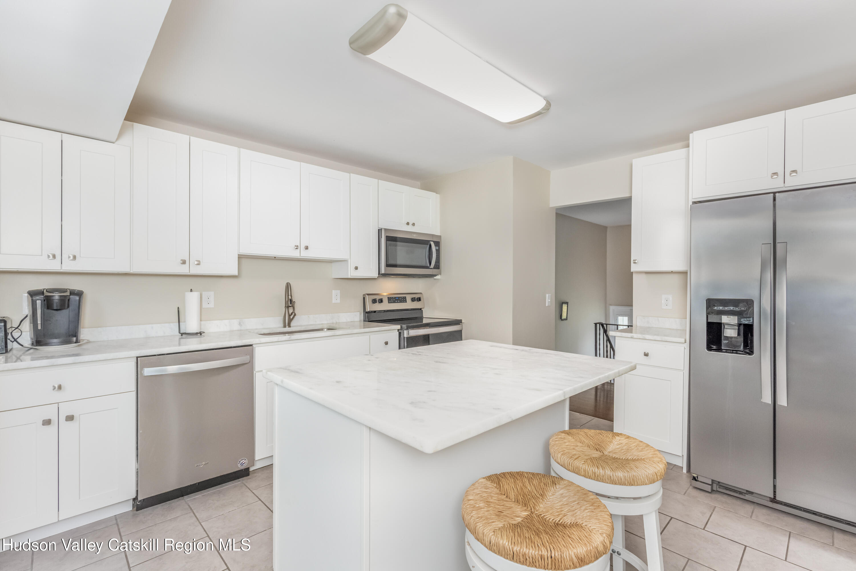 67 Cardinal Drive Poughkeepsie, NY 12601 - Photo 9 of 31 a kitchen with a sink a toilet and refrigerator