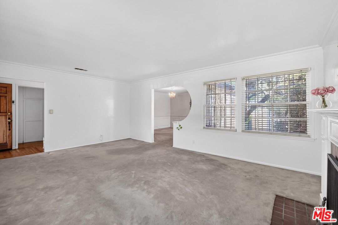 3692 Buckingham Road Los Angeles, CA 90016 - Photo 12 of 40 a view of an empty room with a window