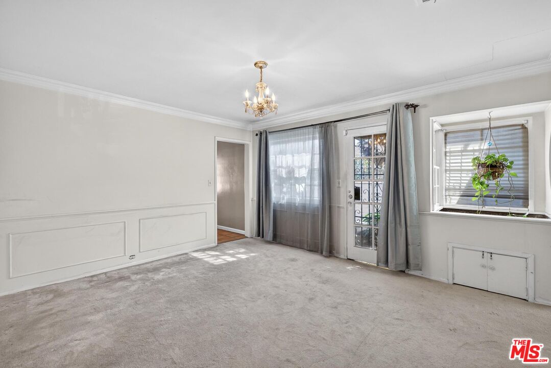 3692 Buckingham Road Los Angeles, CA 90016 - Photo 15 of 40 a view of an empty room with a window