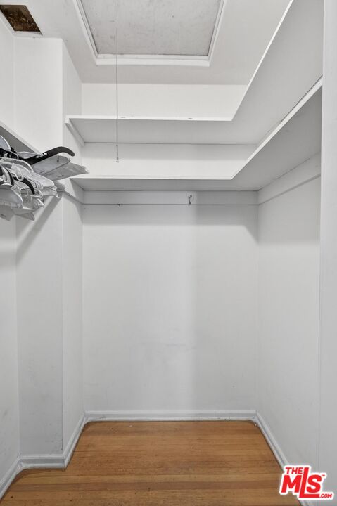 3692 Buckingham Road Los Angeles, CA 90016 - Photo 30 of 40 a view of a room with racks on the wall