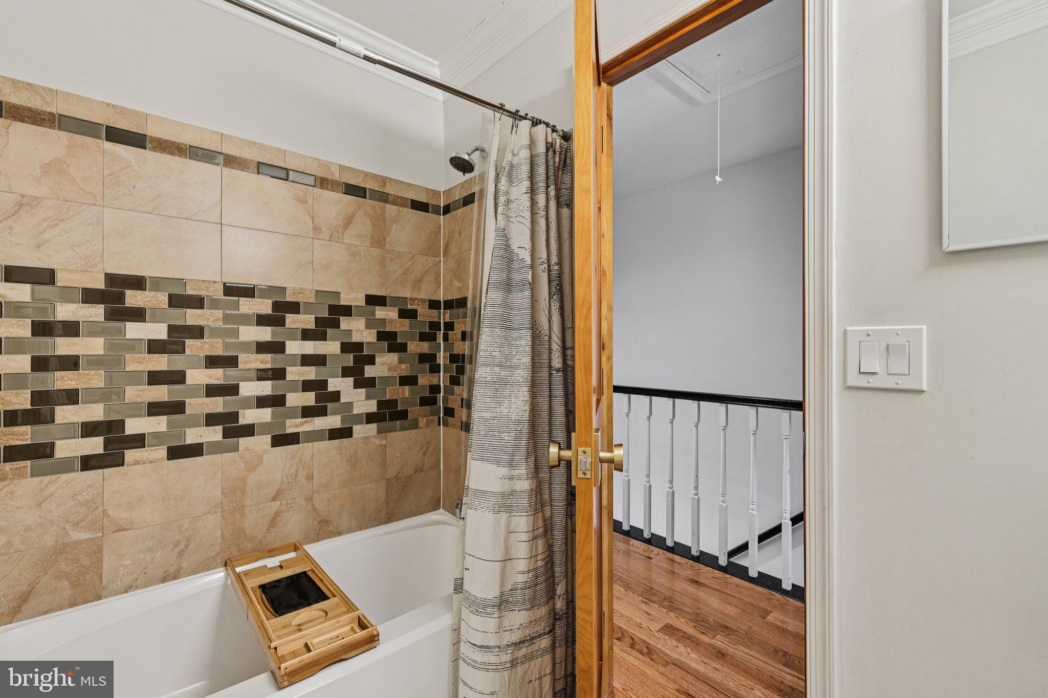 10616 Pennydog Lane Silver Spring, MD 20902 - Photo 25 of 58 a bathroom with a shower