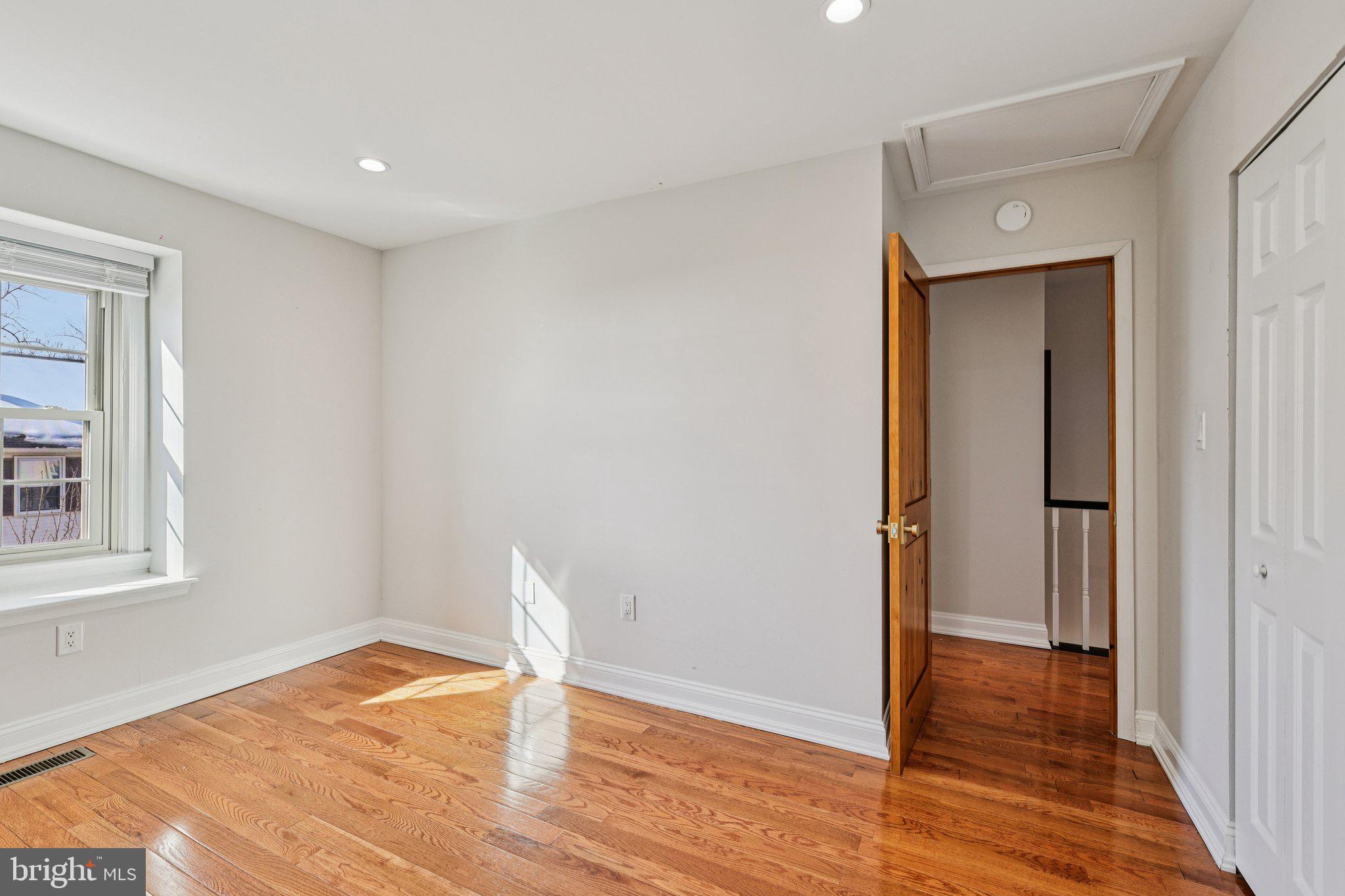10616 Pennydog Lane Silver Spring, MD 20902 - Photo 27 of 58 a view of empty room with wooden floor