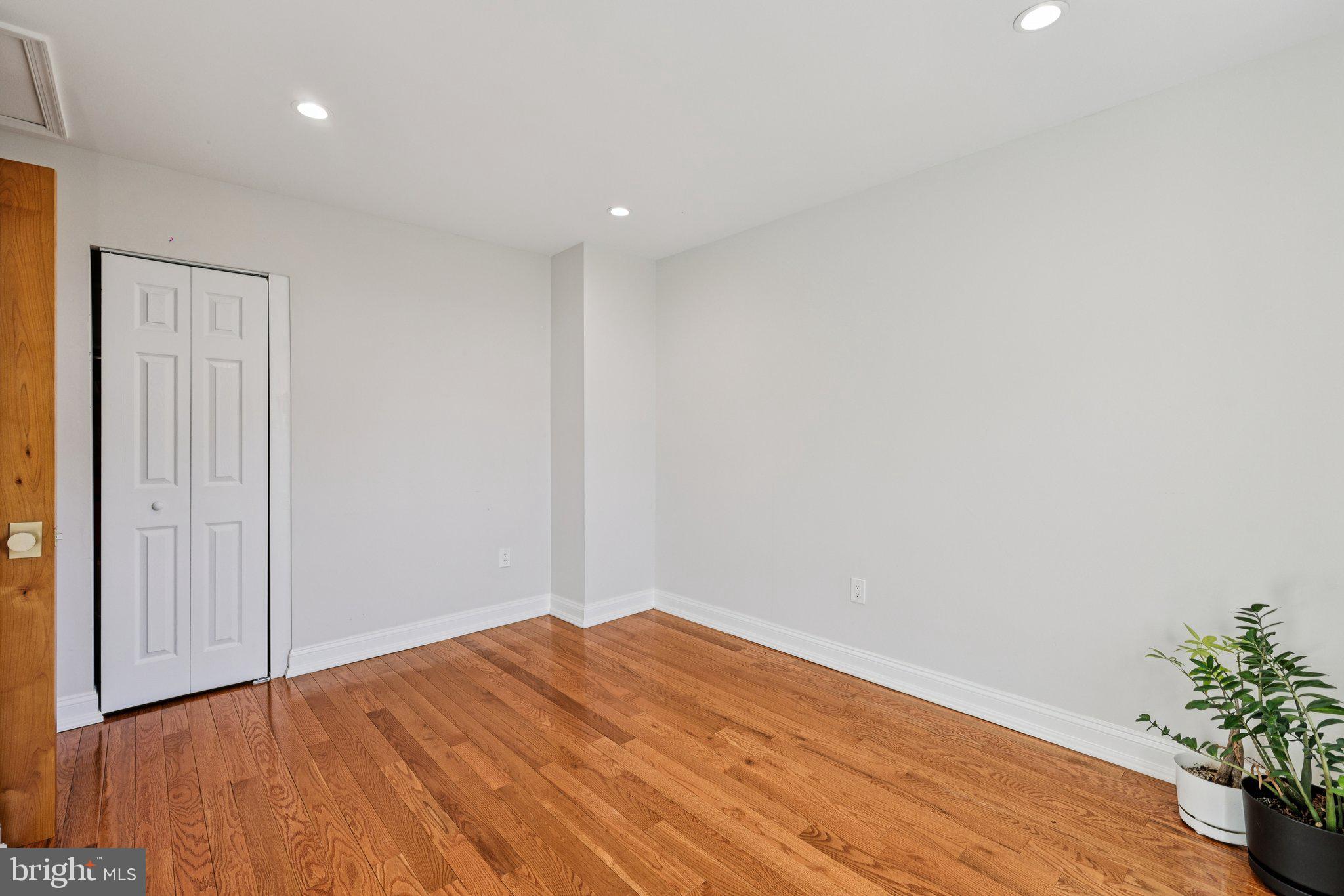 10616 Pennydog Lane Silver Spring, MD 20902 - Photo 28 of 58 a view of empty room with wooden floor