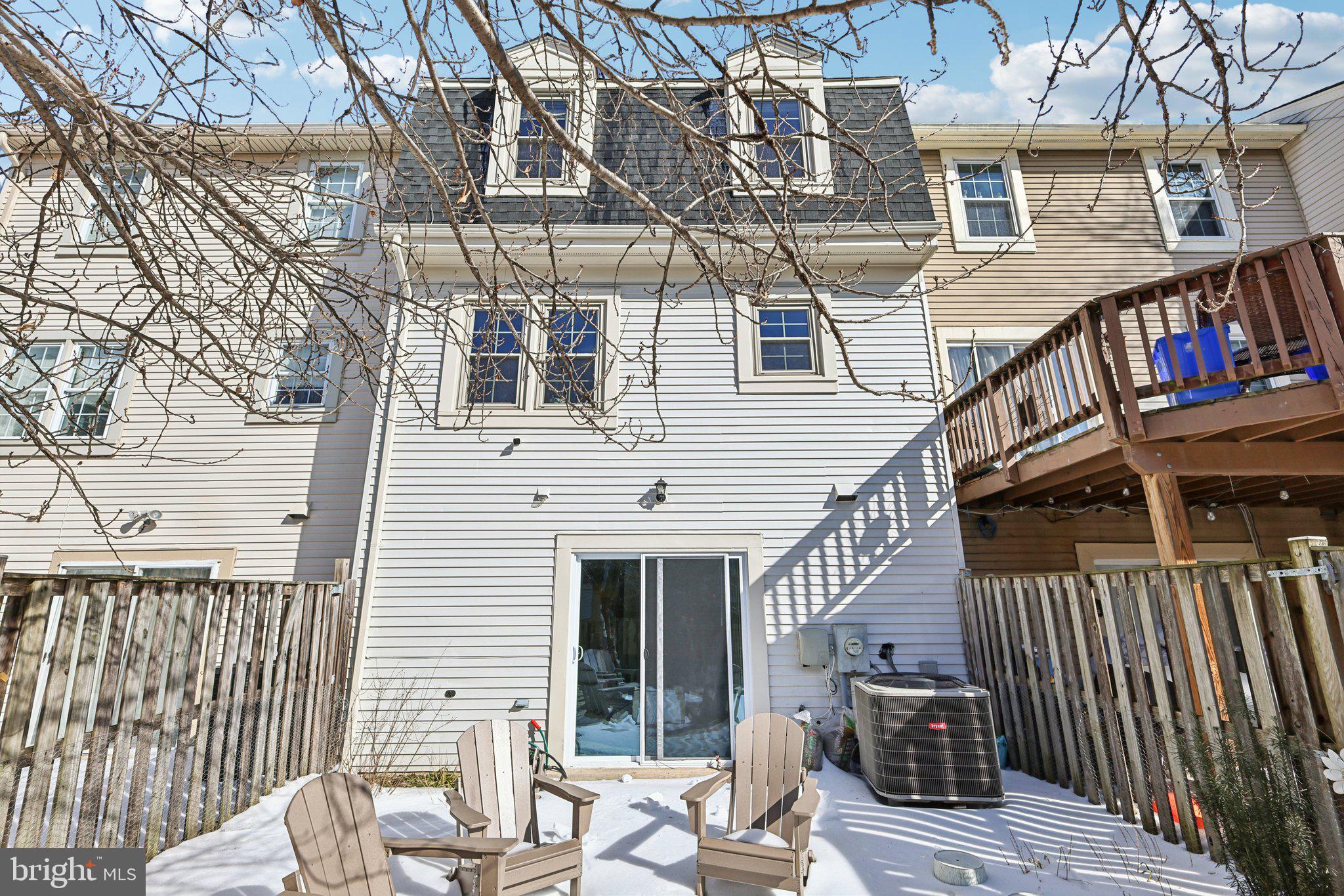 10616 Pennydog Lane Silver Spring, MD 20902 - Photo 43 of 58 a view of a house with a lounge chair