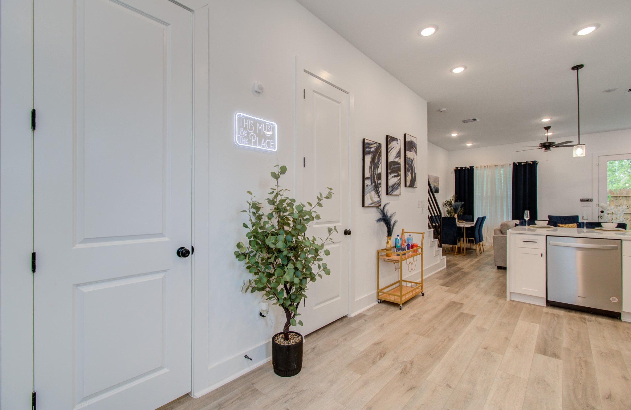 1616 Benson Street Houston, TX 77020 - Photo 11 of 38 a view of a hallway with kitchen and entryway